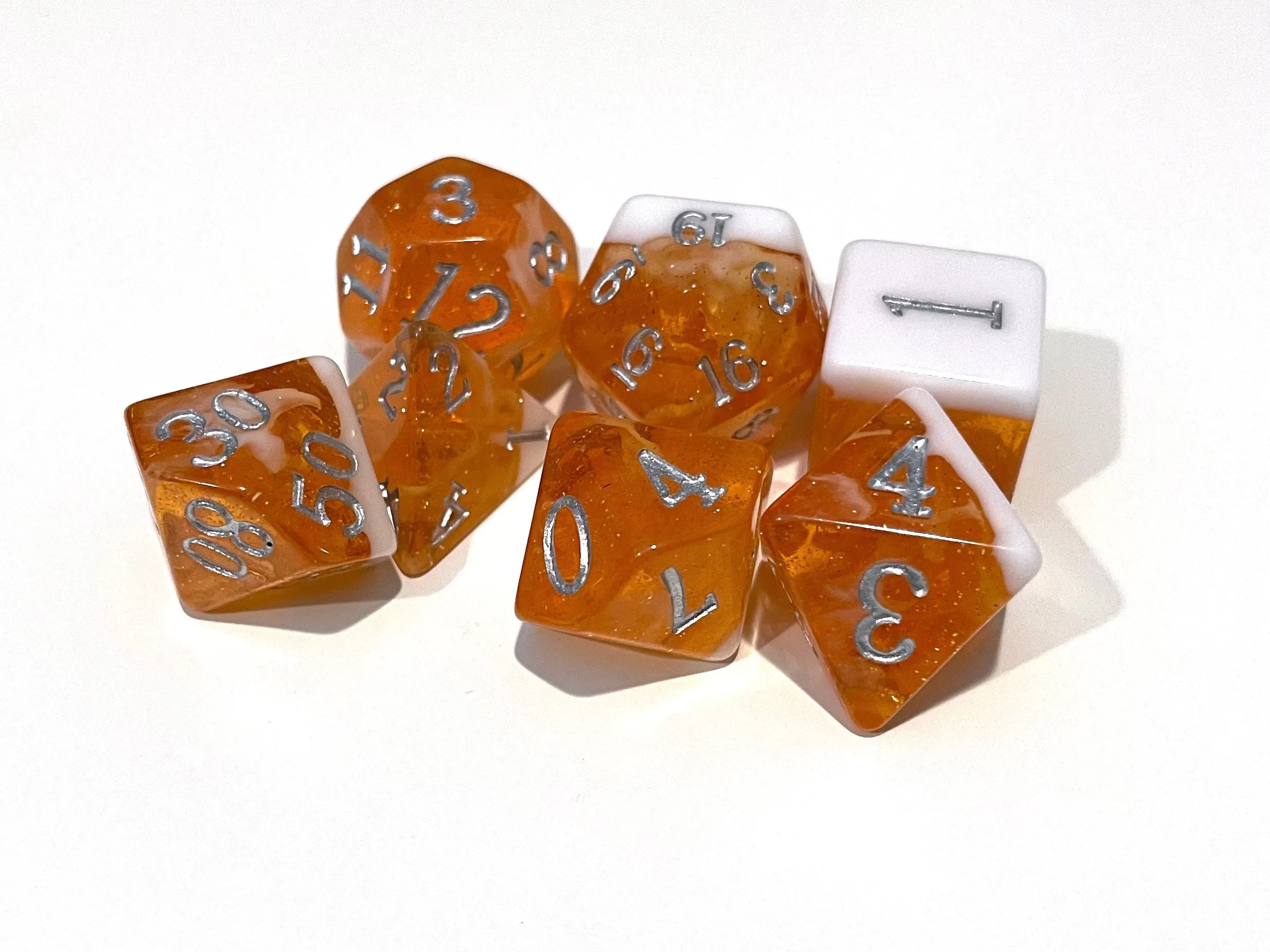 Adventure Dice - Orange Float Silver dice set | Impulse Games and Hobbies